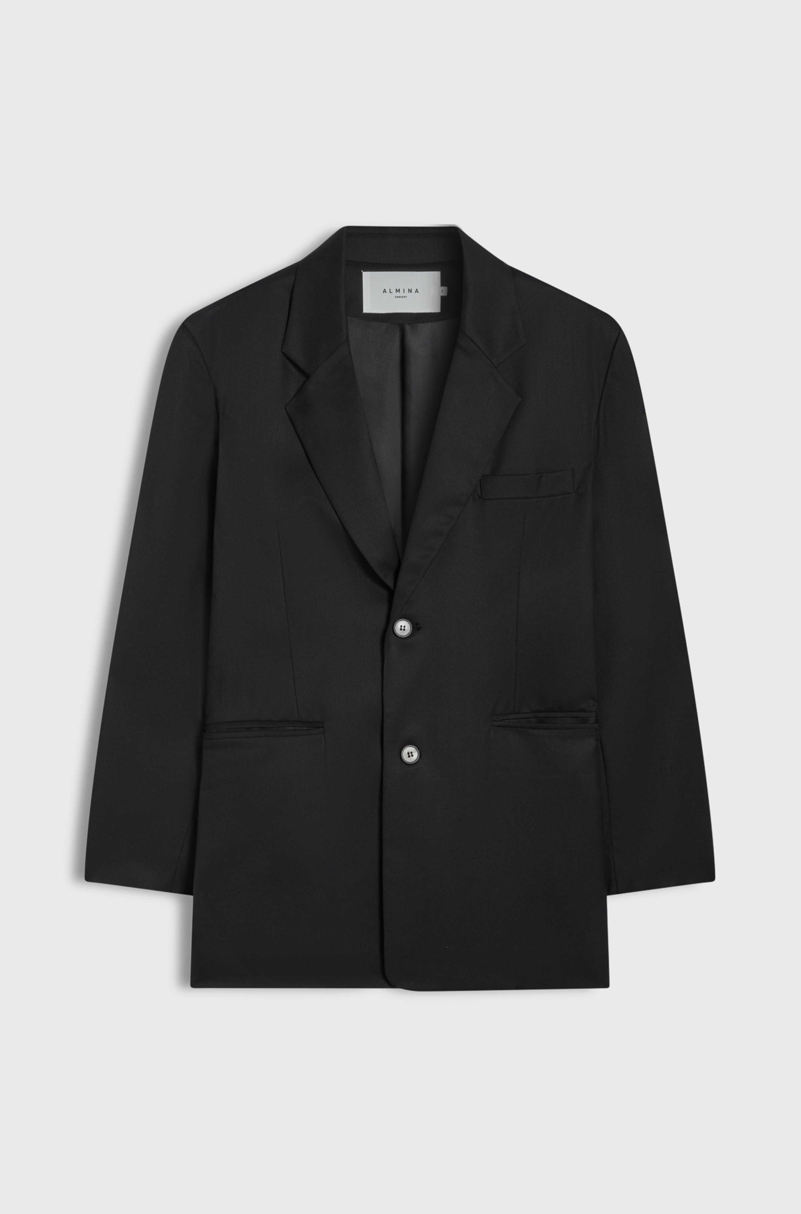 Black blazer on a light gray background